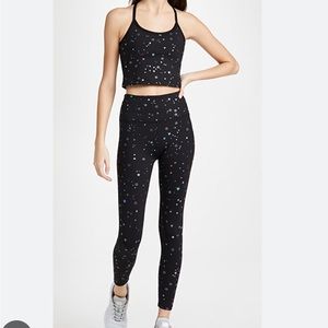 Beyond Yoga Set black with iridescent stars tossed star set